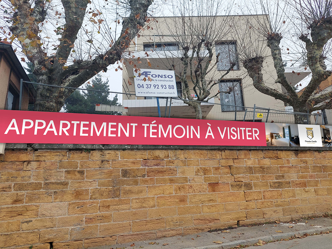 Domaine-Camille - panneau sur grille chantier